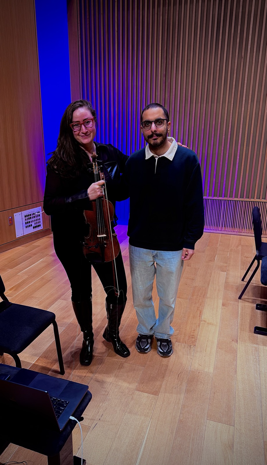 Mahbod Shirvani with the violinist after the performance